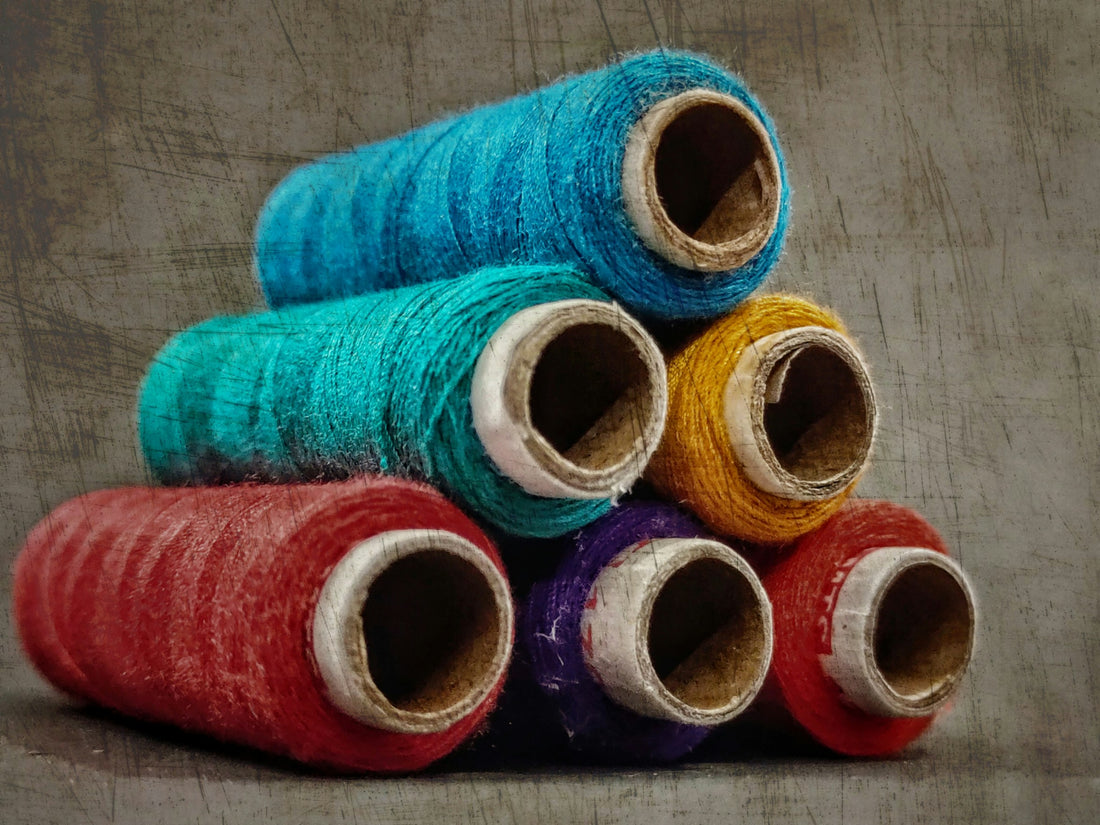 Best Fabrics for Custom Merch & Corporate Apparel: What Holds Print, Stays Vivid, and Lasts